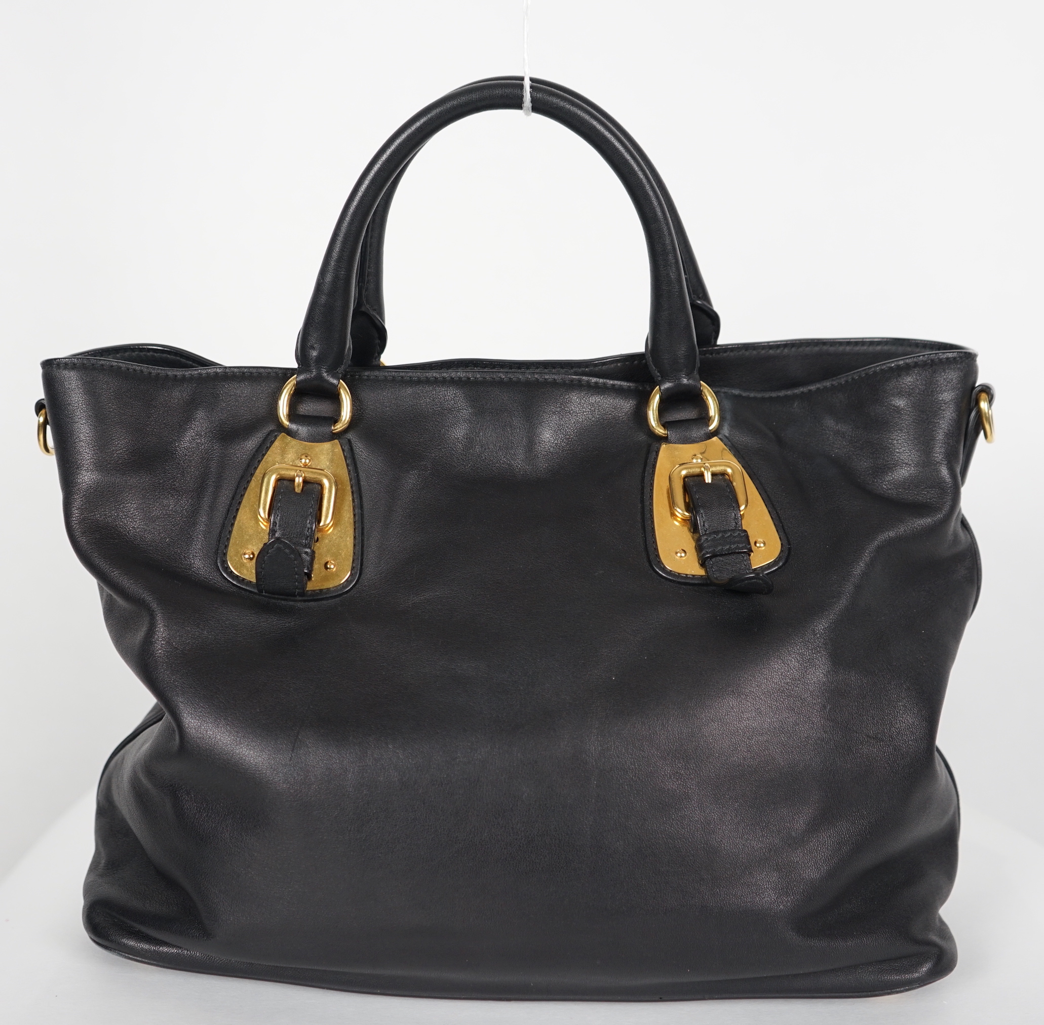 A Prada Vitello black leather bag with detachable strap, width 40cm, max heigh 27cm, depth 17cm